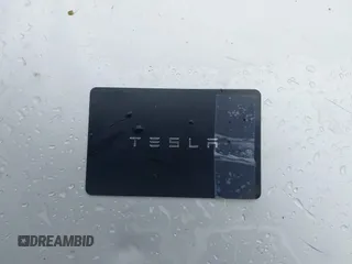 2024 Tesla Model Y Long Range z VIN 7SAYGDEEXRF230169, wystawiony jako IAAI lot #41723049 z przebiegiem Nie podano mil oraz . Historia ofert i sprzedaży dostępna na DreamBid. Obrazek 11.