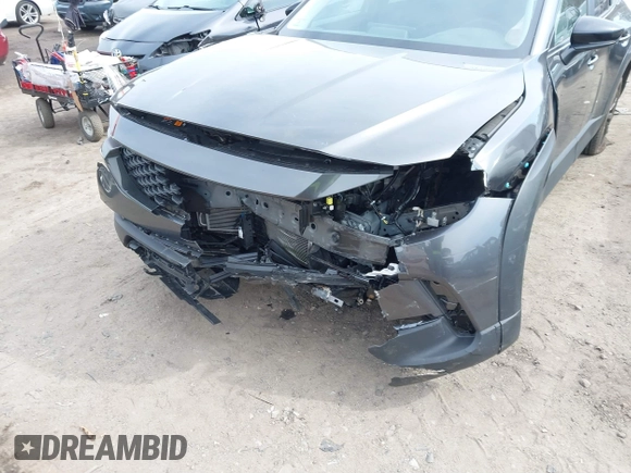 2024 Mazda CX-50 S Preferred with VIN 7MMVABBM0RN160085, listed as a IAAI auction lot 41756979 with 19,353 mi miles and . Bid and sale history available at DreamBid. Image 6.