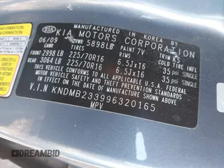 2009 Kia Sedona LX with VIN KNDMB233996320165, listed as a IAAI auction lot 40575451 with 122,057 mi miles. Bid and sale history available at carsss.com. Image 9.