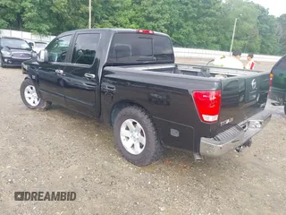 2004 Nissan Titan LE z VIN 1N6AA07A14N592255, wystawiony jako IAAI lot #42264477 z przebiegiem 191 259 mil mil oraz . Historia ofert i sprzedaży dostępna na DreamBid. Obrazek 3.