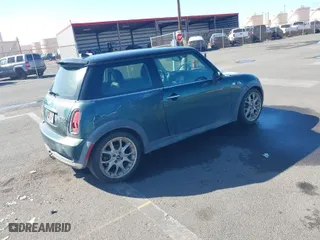 2006 MINI Cooper Hardtop S with VIN WMWRE33566TJ34081, listed as a IAAI auction lot 41265659 with 71,441 mi miles. Bid and sale history available at carsss.com. Image 4.