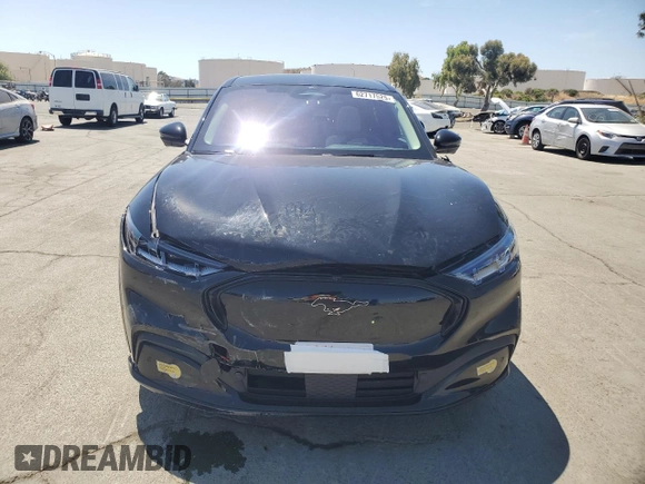 2022 Ford Mustang Mach-E Premium z VIN 3FMTK3R7XNMA24055, wystawiony jako Copart lot #62717525 z przebiegiem 25 079 mil mil oraz Szkoda całkowita • Salvage title. Historia ofert i sprzedaży dostępna na DreamBid. Obrazek 5.