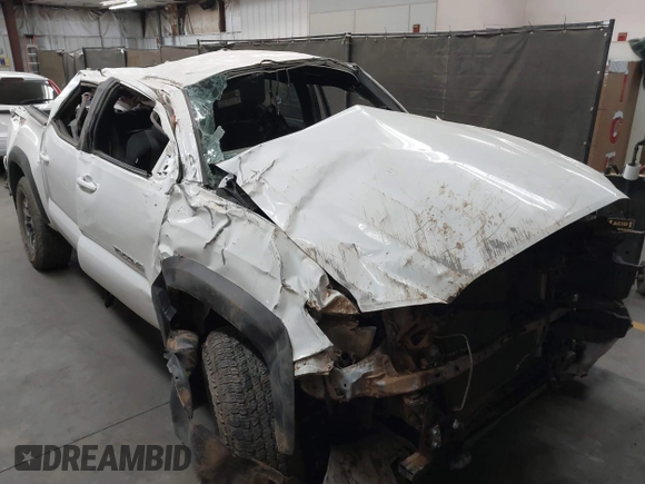 2023 Toyota Tacoma SR with VIN 3TMCZ5ANXPM652495, listed as a IAAI auction lot 42375230 with 26,736 mi miles and . Bid and sale history available at DreamBid. Image 6.