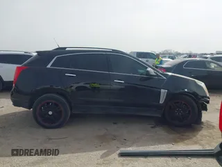 2013 Cadillac SRX z VIN 3GYFNAE3XDS654498, wystawiony jako IAAI lot #41740938 z przebiegiem 134 933 mil mil oraz . Historia ofert i sprzedaży dostępna na DreamBid. Obrazek 13.