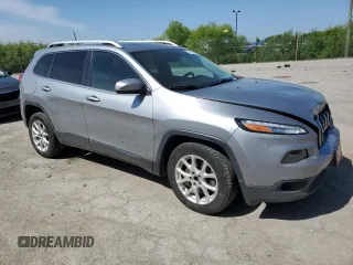 2016 Jeep Cherokee Latitude with VIN 1C4PJLCS3GW108226, listed as a Copart auction lot 57223195 with 118,692 mi miles and Salvage title. Bid and sale history available at DreamBid. Image 4.