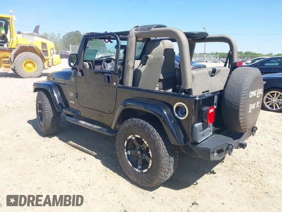 2004 Jeep Wrangler Sahara with VIN 1J4FA59S74P801296, listed as a IAAI auction lot 42049291 with 152,208 mi miles and . Bid and sale history available at DreamBid. Image 3.