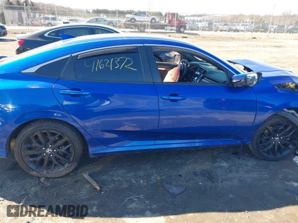 2020 Honda Civic Si with VIN 2HGFC1E59LH707904, listed as a IAAI auction lot 41621372 with 112,077 mi miles and . Bid and sale history available at DreamBid. Image 14.