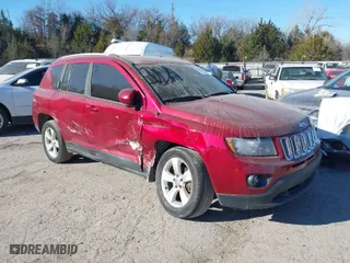2016 Jeep Compass Latitude with VIN 1C4NJDEB1GD662807, listed as a IAAI auction lot 41161996 with 128,030 mi miles. Bid and sale history available at carsss.com. Image 1.