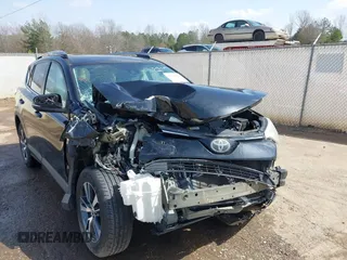2018 Toyota RAV4 XLE with VIN 2T3WFREVXJW444002, listed as a IAAI auction lot 41795600 with 115,120 mi miles. Bid and sale history available at carsss.com. Image 6.