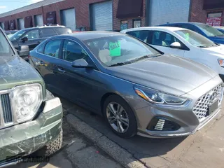 2019 Hyundai Sonata Sport with VIN 5NPE34AF5KH815856, listed as a IAAI auction lot 41687468 with 59,030 mi miles. Bid and sale history available at carsss.com. Image 13.