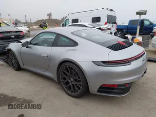 2023 Porsche 911 Carrera with VIN WP0AA2A93PS206048, listed as a IAAI auction lot 42022225 with 6,439 mi miles and . Bid and sale history available at DreamBid. Image 3.