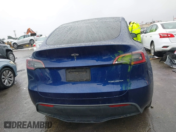 2022 Tesla Model Y Long Range with VIN 7SAYGDEE8NF511395, listed as a IAAI auction lot 41595310 with 65,156 mi miles and . Bid and sale history available at DreamBid. Image 16.