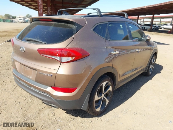 2016 Hyundai Tucson Sport with VIN KM8J33A20GU211615, listed as a IAAI auction lot 41685718 with 97,458 mi miles. Bid and sale history available at carsss.com. Image 4.