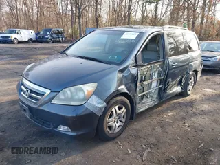 2005 Honda Odyssey EX-L with VIN 5FNRL38615B040637, listed as a IAAI auction lot 41920622 with 92,673 mi miles. Bid and sale history available at carsss.com. Image 2.