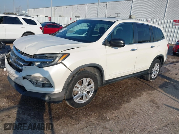2016 Honda Pilot LX with VIN 5FNYF5H13GB016698, listed as a IAAI auction lot 41685173 with 188,001 mi miles and . Bid and sale history available at DreamBid. Image 2.