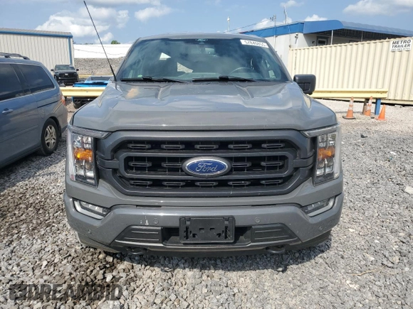 2021 Ford F-150 XL with VIN 1FTFW1E8XMFC22903, listed as a Copart auction lot 57840855 with 66,127 mi miles and Salvage title. Bid and sale history available at DreamBid. Image 5.