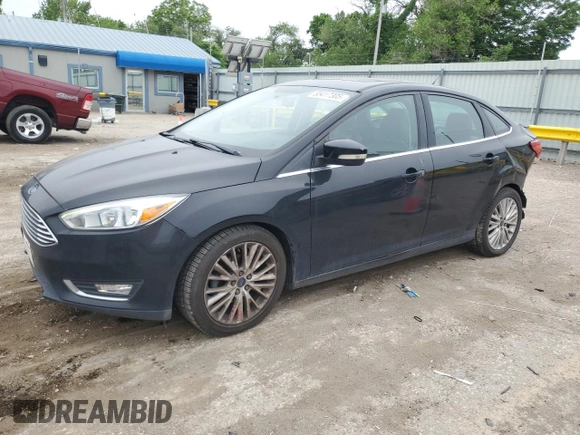 2017 Ford Focus Titanium with VIN 1FADP3J23HL218867, listed as a Copart auction lot 55417305 with 98,710 mi miles and Salvage title. Bid and sale history available at DreamBid. Image 1.