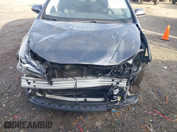 2021 Toyota Prius L Eco z VIN JTDKAMFU1M3149965, wystawiony jako IAAI lot #38641916 z przebiegiem 69 942 mil mil oraz . Historia ofert i sprzedaży dostępna na DreamBid. Obrazek 6.