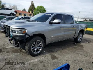 2020 Ram 1500 Laramie with VIN 1C6SRFJTXLN350079, listed as a Copart auction lot 56583095 with 43,226 mi miles and Salvage title. Bid and sale history available at DreamBid. Image 1.