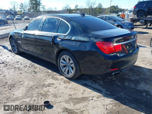 2011 BMW 7 Series 740i with VIN WBAKA4C58BC392020, listed as a IAAI auction lot 41314751 with 116,553 mi miles. Bid and sale history available at carsss.com. Image 3.