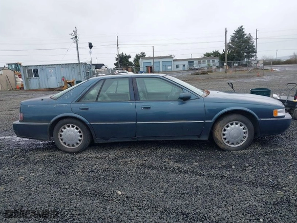 1993 Cadillac Seville Touring STS with VIN 1G6KY5290PU821230, listed as a IAAI auction lot 41778659 with NaN miles. Bid and sale history available at carsss.com. Image 13.