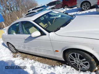 2005 Jaguar S-Type with VIN SAJWA01T75FN17656, listed as a IAAI auction lot 41282140 with 126,631 mi miles and . Bid and sale history available at DreamBid. Image 13.