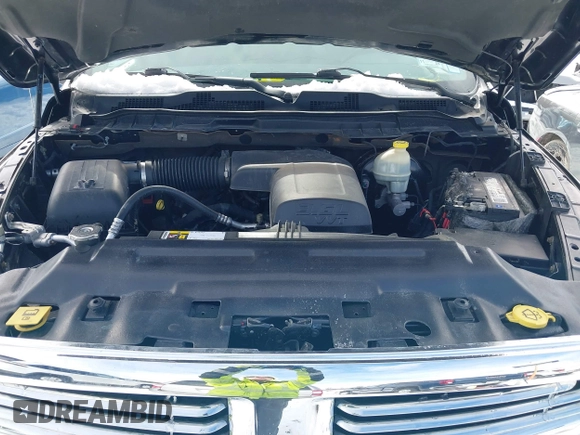 2015 Ram 1500 Outdoorsman z VIN 1C6RR7GGXFS606208, wystawiony jako IAAI lot #41660434 z przebiegiem 135 087 mil mil oraz . Historia ofert i sprzedaży dostępna na DreamBid. Obrazek 10.