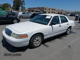 2004 Ford Crown Victoria LX z VIN 2FAFP74W34X170637, wystawiony jako IAAI lot #42478531 z przebiegiem 168 885 mil mil oraz . Historia ofert i sprzedaży dostępna na DreamBid. Obrazek 2.