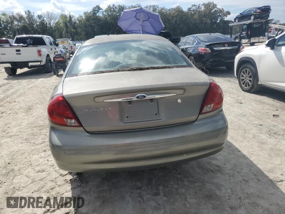 2001 Ford Taurus z VIN 1FAFP52231A266843, wystawiony jako Copart lot #45967495 z przebiegiem 80 057 mil mil oraz Czysty tytuł • Clean title. Historia ofert i sprzedaży dostępna na DreamBid. Obrazek 6.