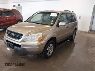 2005 Honda Pilot EX-L with VIN 2HKYF18595H542103, listed as a IAAI auction lot 41472326 with 269,844 mi miles. Bid and sale history available at carsss.com. Image 2.