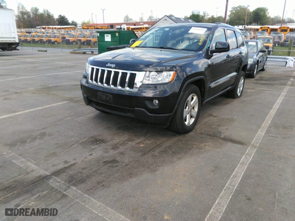 2011 Jeep Grand Cherokee Laredo with VIN 1J4RR4GTXBC538060, listed as a IAAI auction lot 41964694 with 152,999 mi miles. Bid and sale history available at carsss.com. Image 2.