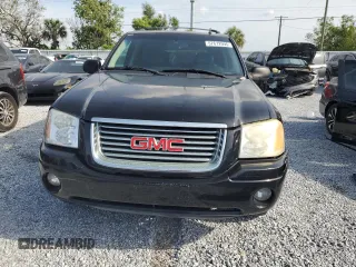 2006 GMC Envoy SLE z VIN 1GKDS13S062176000, wystawiony jako Copart lot #57672995 z przebiegiem 161 455 mil mil oraz Szkoda całkowita • Salvage title. Historia ofert i sprzedaży dostępna na DreamBid. Obrazek 5.