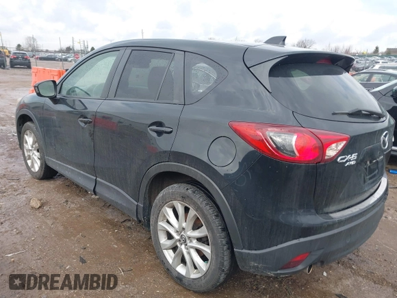 2014 Mazda CX-5 Grand Touring with VIN JM3KE4DY5E0373731, listed as a IAAI auction lot 41517852 with 148,414 mi miles. Bid and sale history available at carsss.com. Image 3.