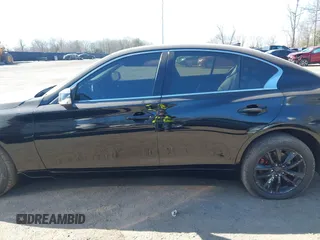2015 Infiniti Q50 Sport with VIN JN1BV7ARXFM392361, listed as a IAAI auction lot 41771720 with 91,961 mi miles and . Bid and sale history available at DreamBid. Image 14.