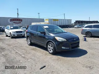 2015 Ford Escape SE with VIN 1FMCU9GX3FUC14020, listed as a IAAI auction lot 42069921 with 111,113 mi miles. Bid and sale history available at carsss.com. Image 1.