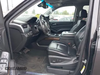 2015 Chevrolet Tahoe LT with VIN 1GNSCBKC1FR233898, listed as a IAAI auction lot 42004048 with 115,779 mi miles and . Bid and sale history available at DreamBid. Image 5.