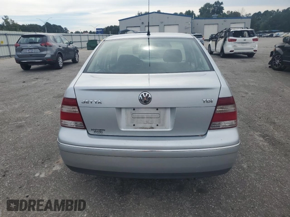 2004 Volkswagen Jetta GL with VIN 3VWRR69M34M108439, listed as a Copart auction lot 74029704 with 296,984 mi miles and Salvage title. Bid and sale history available at DreamBid. Image 6.