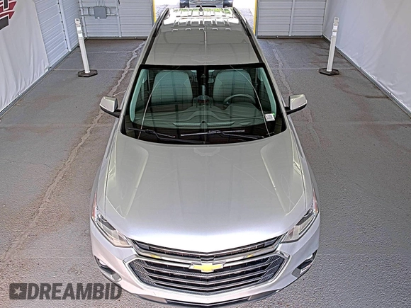 2021 Chevrolet Traverse LT Cloth with VIN 1GNERGKW3MJ163142, listed as a IAAI auction lot 42325073 with 66,869 mi miles and . Bid and sale history available at DreamBid. Image 1.