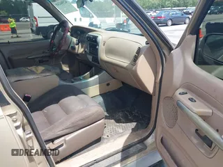 2001 Ford Explorer Sport Trac with VIN 1FMZU67E51UC84439, listed as a IAAI auction lot 42504240 with 290,657 mi miles and . Bid and sale history available at DreamBid. Image 5.