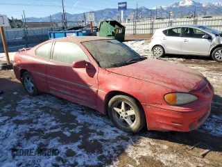 1999 Pontiac Grand Am GT with VIN 1G2NW12E4XM873986, listed as a Copart auction lot 42249455 with 0 mi miles and Clean Title. Bid and sale history available at carsss.com. Image 4.
