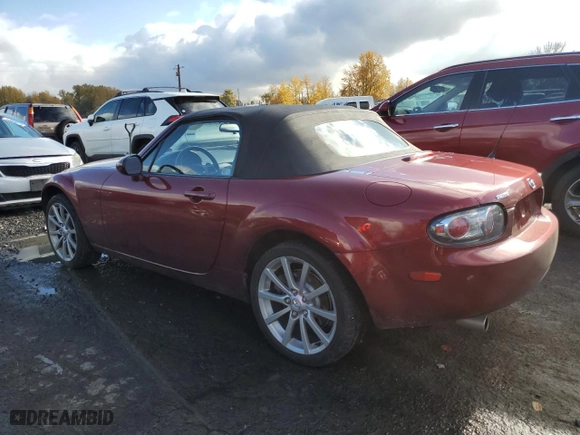 2006 Mazda MX-5 Miata Touring with VIN JM1NC25F260116122, listed as a Copart auction lot 80797644 with NaN miles and Salvage Title. Bid and sale history available at carsss.com. Image 2.
