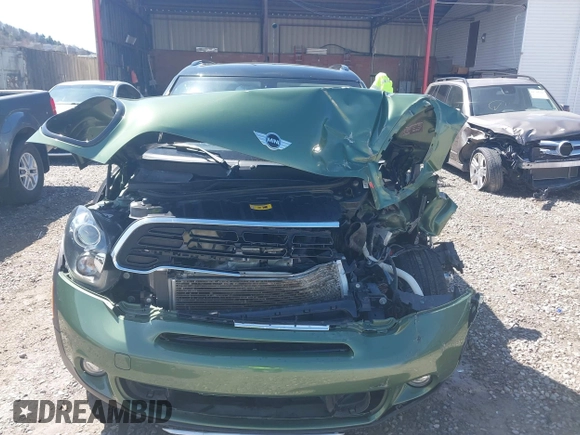 2016 MINI Countryman S z VIN WMWZC5C50GWU03242, wystawiony jako IAAI lot #41912462 z przebiegiem 68 477 mil mil oraz . Historia ofert i sprzedaży dostępna na DreamBid. Obrazek 13.
