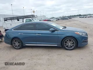 2015 Hyundai Sonata Sport with VIN 5NPE34AB5FH163825, listed as a IAAI auction lot 42013743 with Not Provided miles and . Bid and sale history available at carsss.com. Image 14.