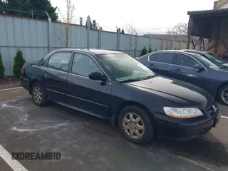 2002 Honda Accord EX z VIN JHMCG56682C032857, wystawiony jako IAAI lot #41975808 z przebiegiem 260 119 mil mil oraz . Historia ofert i sprzedaży dostępna na DreamBid. Obrazek 1.