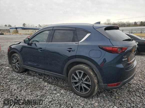 2017 Mazda CX-5 Grand Touring with VIN JM3KFADL3H0125143, listed as a Copart auction lot 50178005 with 160,058 mi miles and Salvage Title. Bid and sale history available at carsss.com. Image 2.