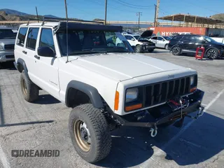 1997 Jeep Cherokee SE with VIN 1J4FJ28S7VL553270, listed as a IAAI auction lot 41825524 with 157,015 mi miles. Bid and sale history available at carsss.com. Image 1.