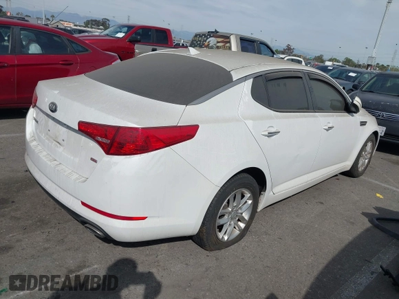 2013 Kia Optima LX with VIN 5XXGM4A79DG193534, listed as a IAAI auction lot 41690584 with 100,287 mi miles. Bid and sale history available at carsss.com. Image 4.