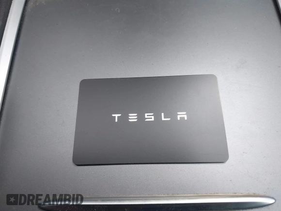 2023 Tesla Model Y Long Range with VIN 7SAYGDEE0PA183891, listed as a IAAI auction lot 42205573 with 41,273 mi miles and . Bid and sale history available at DreamBid. Image 11.