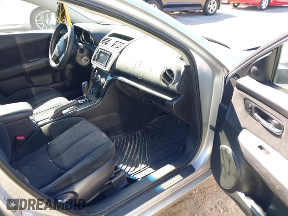 2009 Mazda 6 i Touring with VIN 1YVHP82A995M06002, listed as a IAAI auction lot 41903790 with 134,134 mi miles and . Bid and sale history available at DreamBid. Image 5.