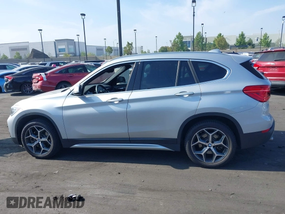 2019 BMW X1 xDrive28i with VIN WBXHT3C56K5L38658, listed as a IAAI auction lot 42496734 with 49,373 mi miles and . Bid and sale history available at DreamBid. Image 14.